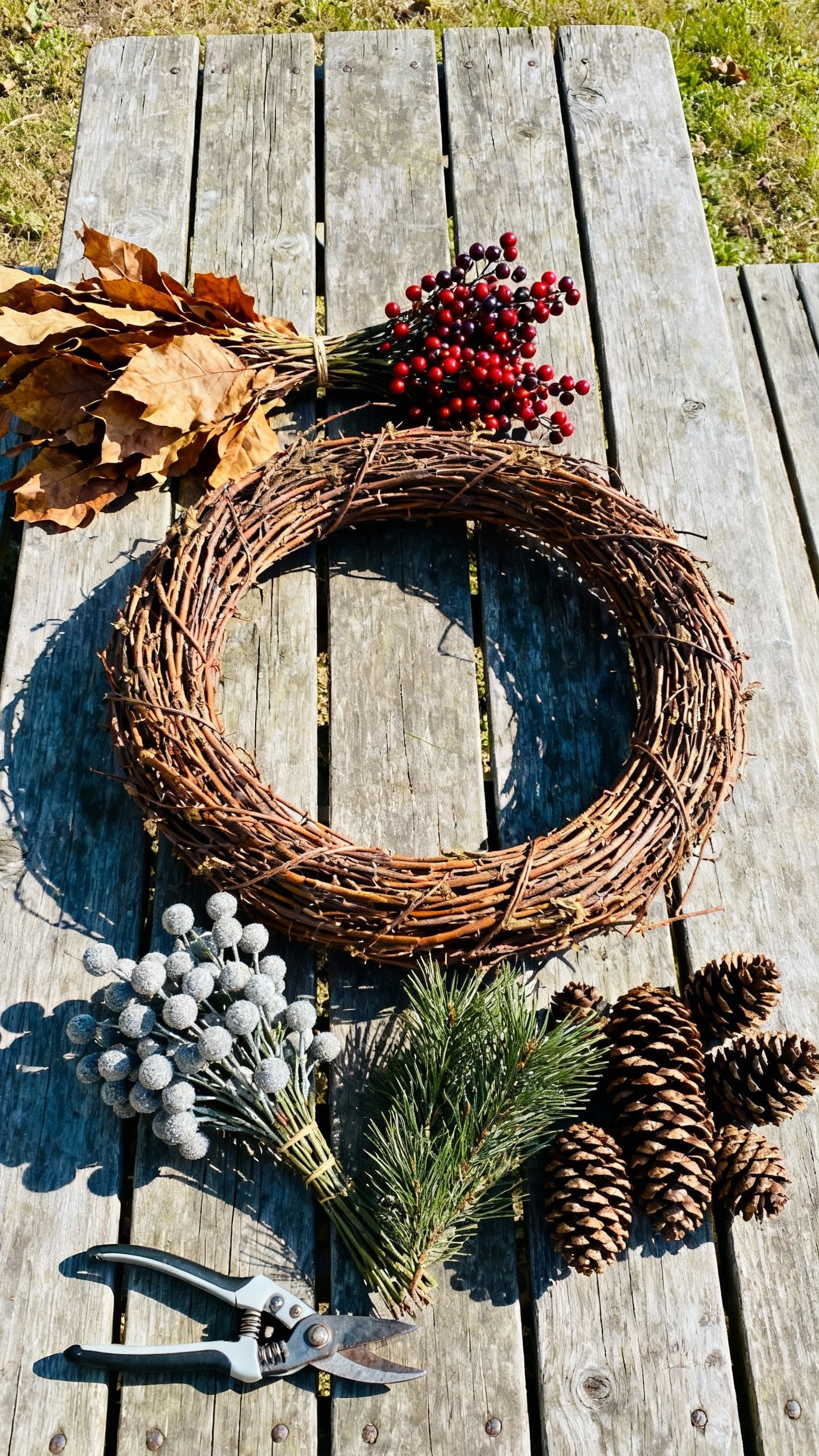 fall wreaths - Crafting Autumn Wreaths: A Natural Touch - Golden sunlight bathes a rustic picnic table, where...