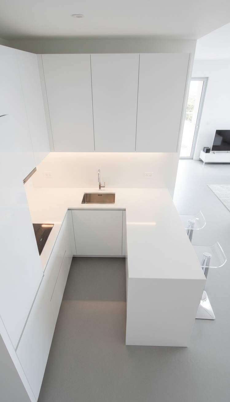 open kitchen ideas - Open Kitchens: Modern Efficiency in View - The crisp white Corian countertop immediately grabs your...