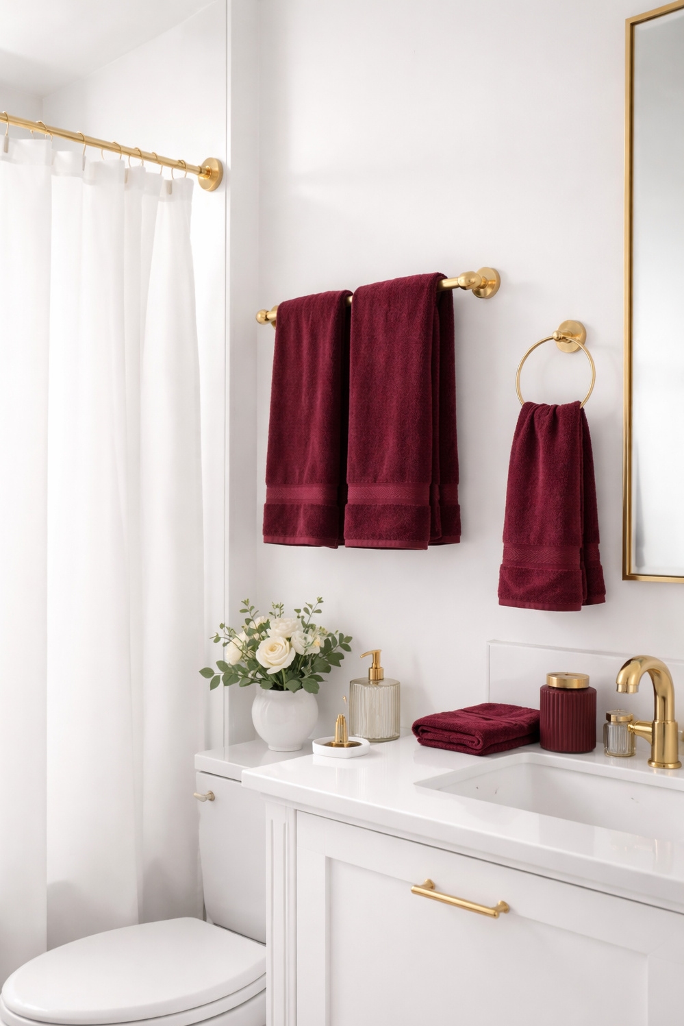 Burgundy and gold bathroom design ideas - Burgundy Towels Bring Bathroom Warmth - These burgundy towels bring warmth to the crisp...